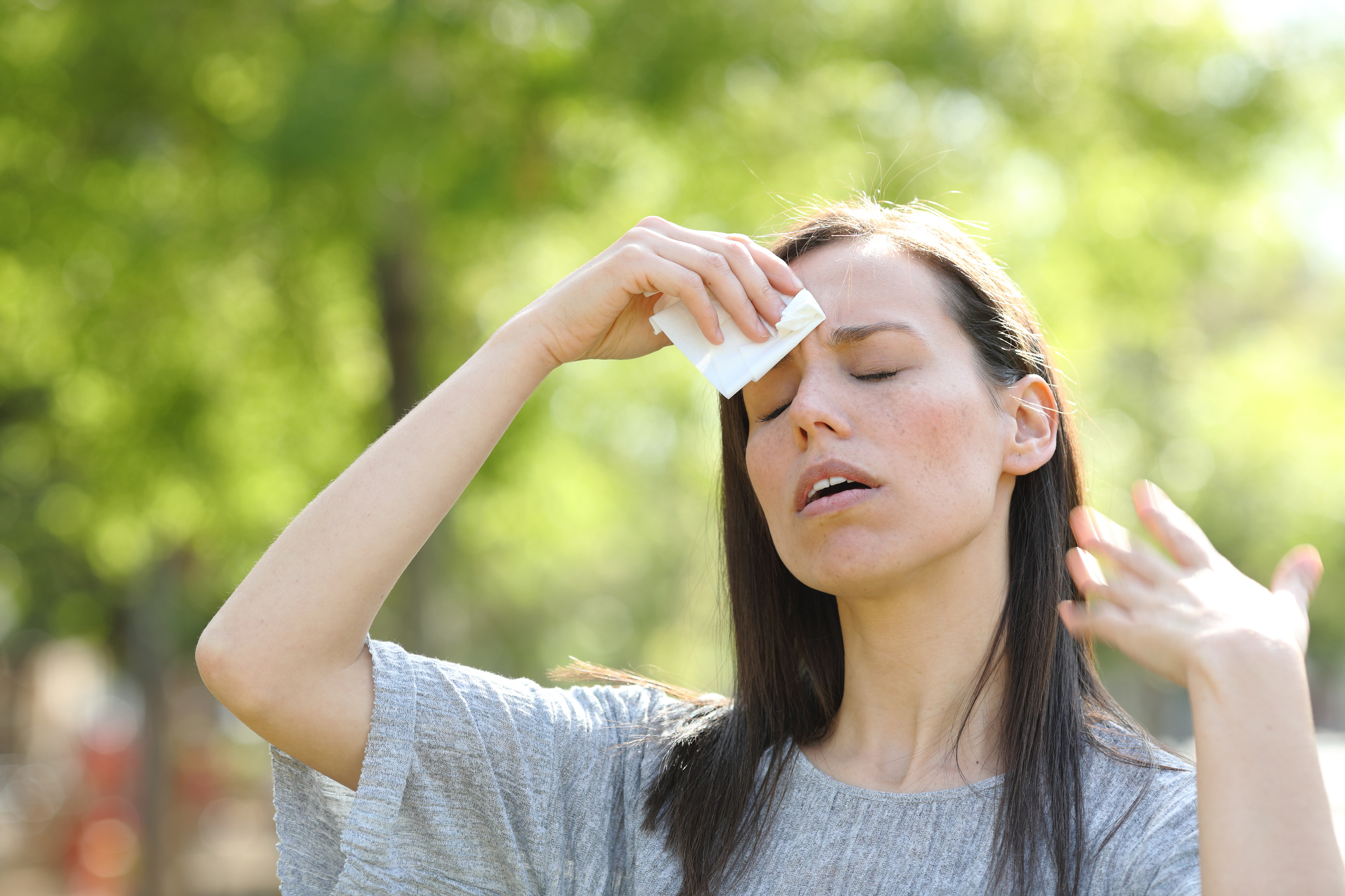Woman receiving hydration IV therapy for dehydration relief